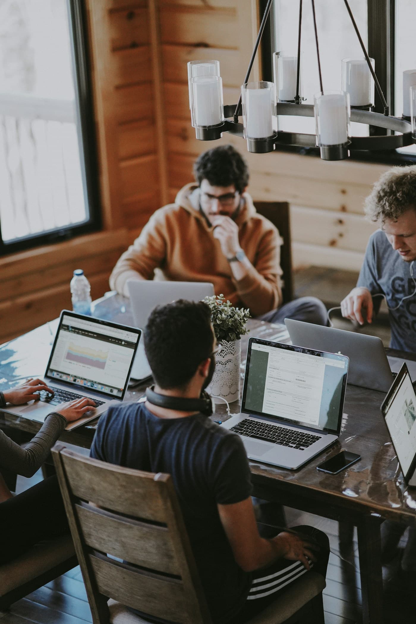Professionals collaborating around a table in a modern office